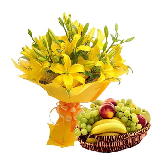 Fresh seasonal fruit basket paired with a colorful flower bouquet for delivery in Hyderabad